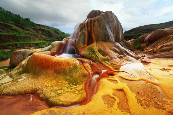 Vivid soils of Analavory geysers Madagascar