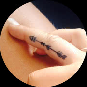 Small Arrow Tattoo Design: On Finger