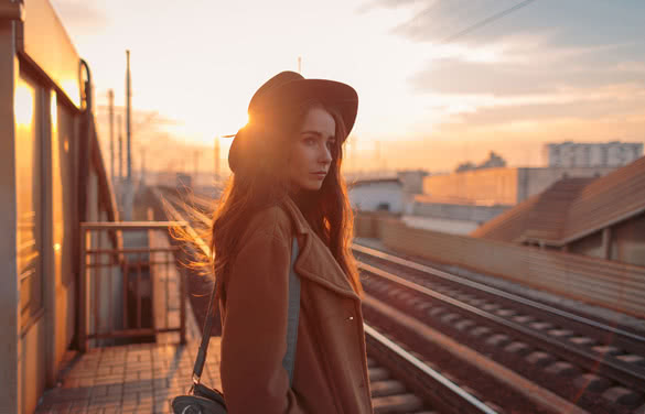 beautiful young woman on railway platform