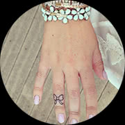 Small Bow Tattoo Design: On Ring Finger Top