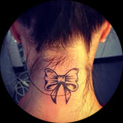 Small Bow Tattoo Design: Back of Neck In Color