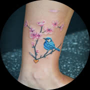 Small Cherry Blossom Tattoo Design: On Ankle