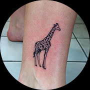 Small Giraffe Tattoo Design: On Ankle