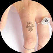 Small Hamsa Tattoo Design: On Finger