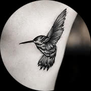 Small Hummingbird Tattoo Design: Rib Cage