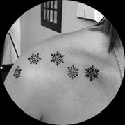 Small Snowflake Tattoo Design: Right Front Shoulder