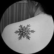 Small Snowflake Tattoo Design: Left Back Upper Shoulder