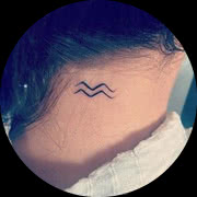 Small Zodiac Sign Tattoo Design: Aquarius Sign Tattoo on Back of the Neck