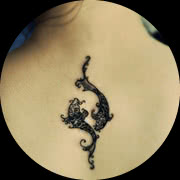 Small Zodiac Sign Tattoo Design: Pisces Sign Tattoo on Middle Upper Back
