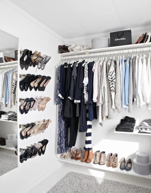 Well-organized closet full of clothes to refresh your work wardrobe