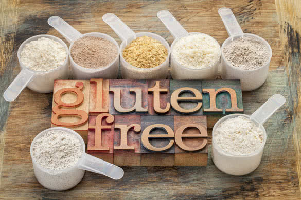 measuring scoops of gluten free flours