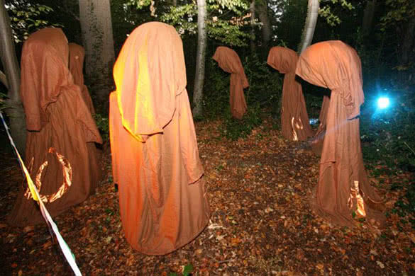 spooky figures in the forest on Halloween night