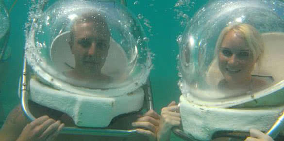 Aquaventure adventurers in bubble helmets