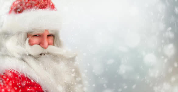 Santa Claus portrait smiling in snowfall
