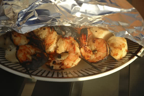 grilled shrimp covered with aluminium foil