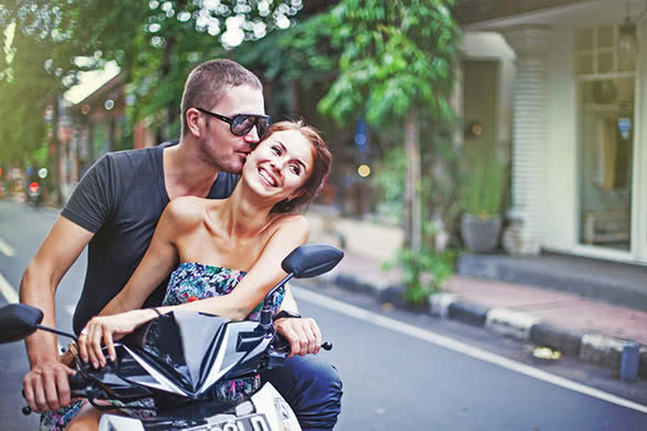 couple-riding-motorcycle