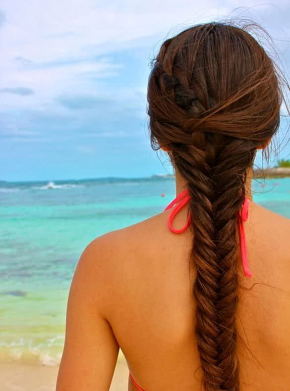girl-on-a-beach-with-fishtail-hairstyle