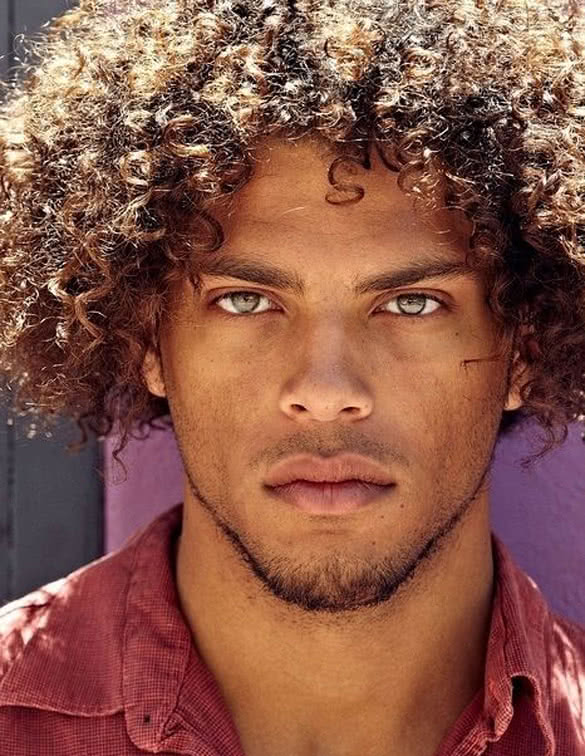 man-with-green-eyes-and-afro-hair