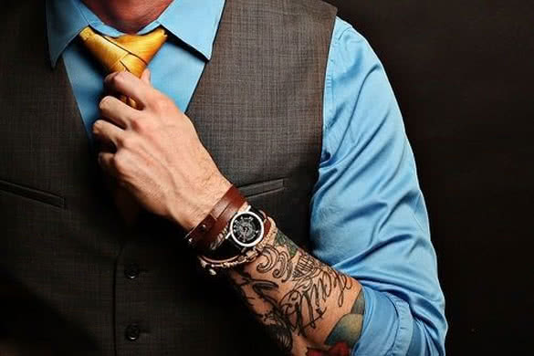 tattoo-on-the-arm-under-the-suit