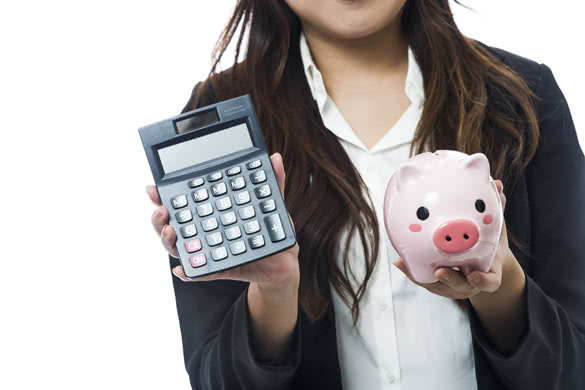 woman-holding-a-piggy-bank-and-a-calculator