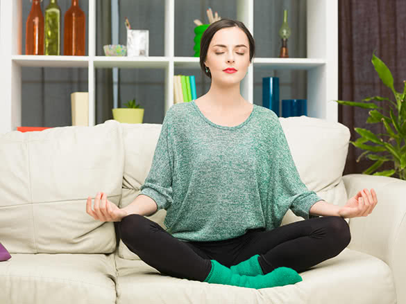 woman-meditating-at-her-home