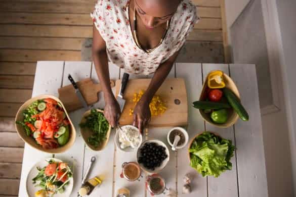 Young African Woman Cooking