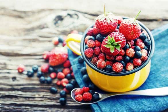 Berries on Wooden Background