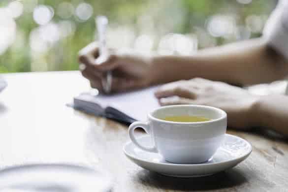 woman writing a diary