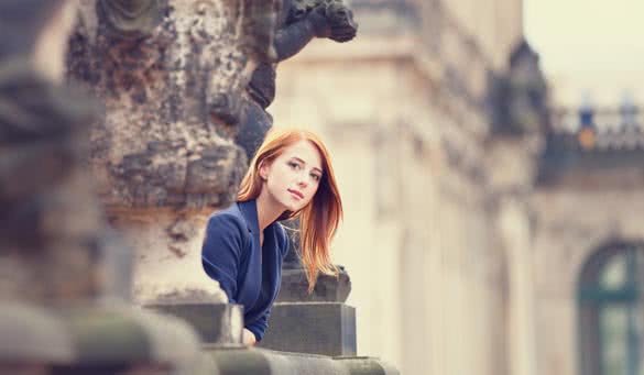 Portrait of a beautiful redhead girl in Dresden