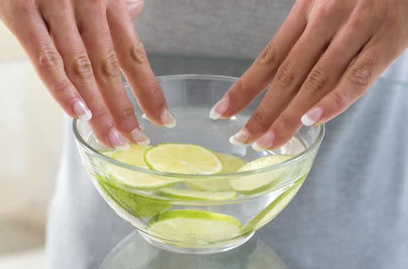 hands spa treatment with lime