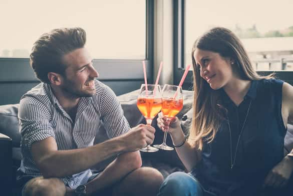 young beautiful couple lovers at the cafe