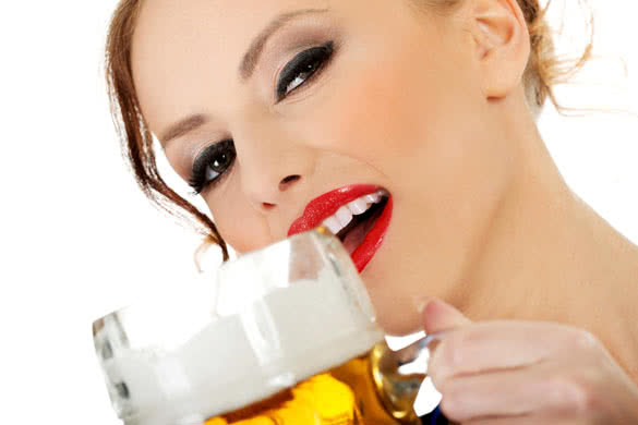 Bavarian woman drinking beer