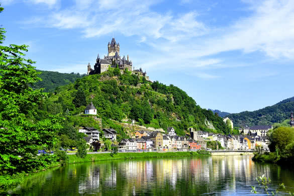 Castle Reichsburg sits above the medieval town of Cochem on the Mosel River