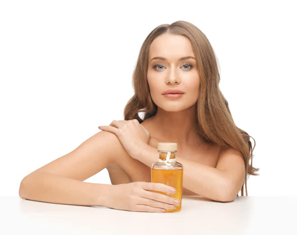 picture of beautiful woman with oil bottle