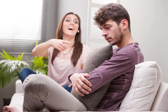 frustrated and very sad man laughed by his woman