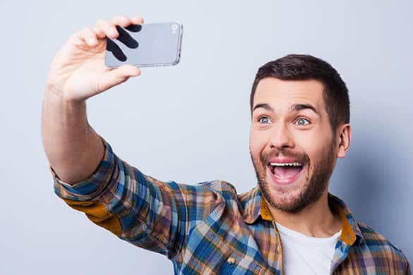 man taking selfie