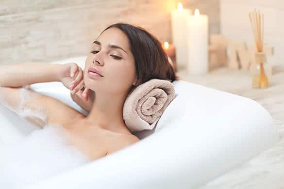 woman taking bubble bath