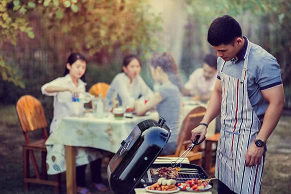 man making barbecue