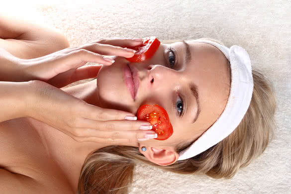 Woman with fresh tomatoes mask 2