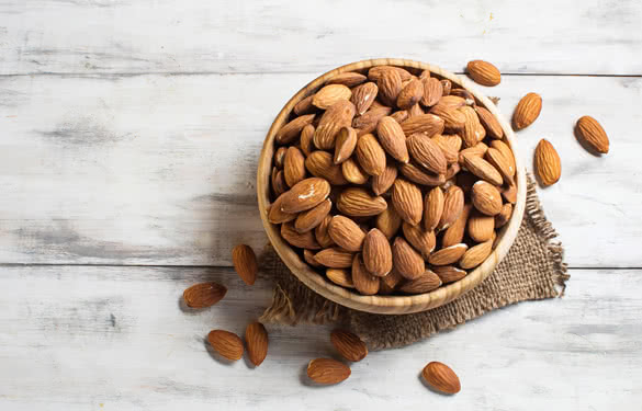 Almonds in brown bowl