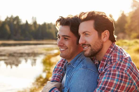 Head And Shoulders Shot Of Romantic Male Gay Couple