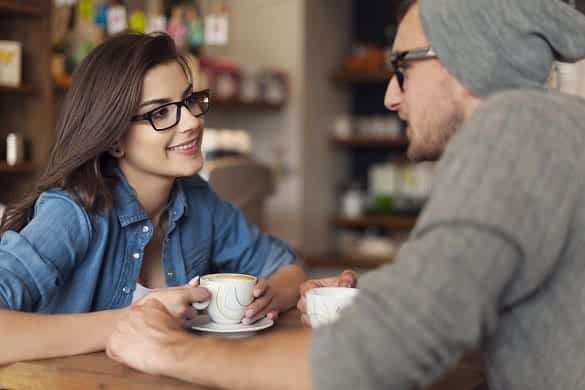 couple talking over a cup of coffee