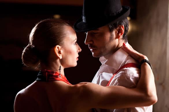 Close-up of a man and a woman dancing argentinian tango