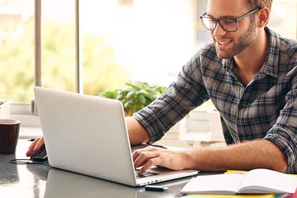 man using laptop