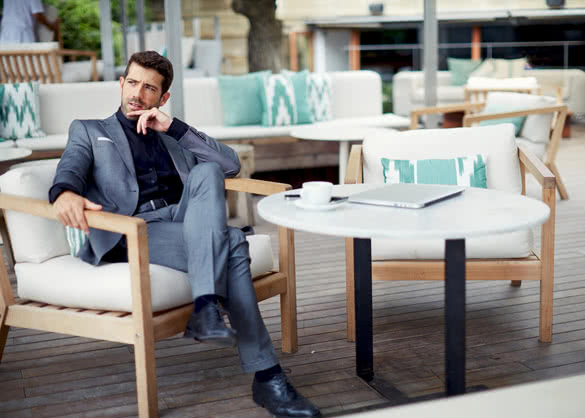 Successful intelligent business man relaxing in a luxury restaurant outdoors