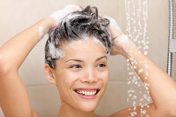 asian woman washing hair