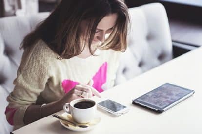 woman looking at a phone