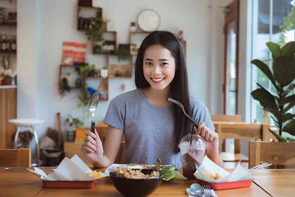 asian woman eating healthy