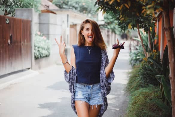 Happy stylish hipster girl