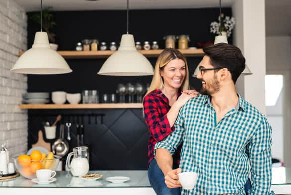 Shot of a couple drinking a morning coffee together